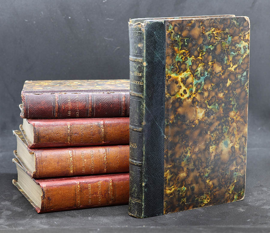 Five stacked books from HCCA
