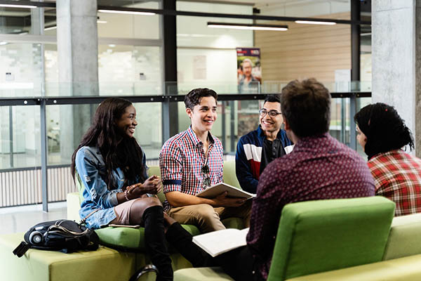 Students talking in the Library
